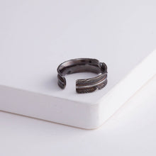 Load image into Gallery viewer, Oxidized silver infinity feather ear cuff (medium)