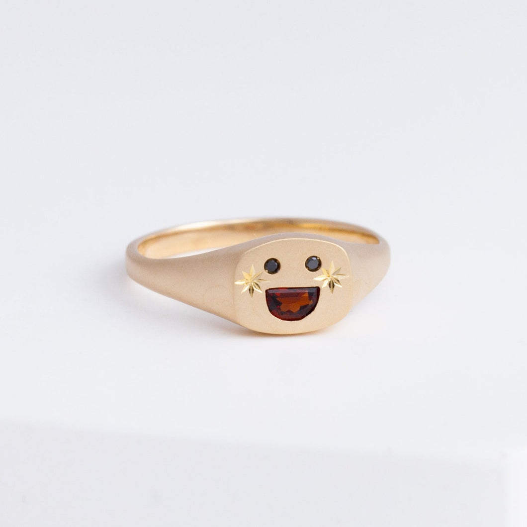 Small happy face signet ring with sparkly cheeks