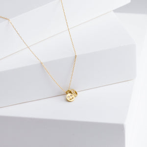 Two smiley diamond necklace