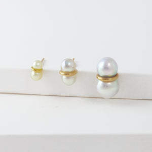 Large twin pearl earrings