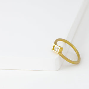 Position yellow gold rectangle frame marquis diamond ring