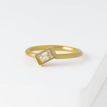 Position yellow gold rectangle frame marquis diamond ring