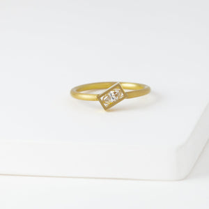 Position yellow gold rectangle frame marquis diamond ring