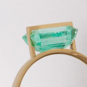 Band one-of-a-kind emerald ring