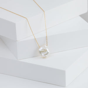 Smiley on pearl with diamonds necklace