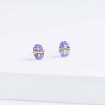 Band oval tanzanite studs