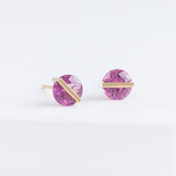 Band round garnet studs