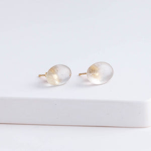 Rough stone topaz pebble stud