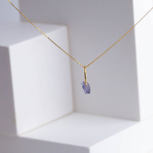 Rough stone spinel pendant