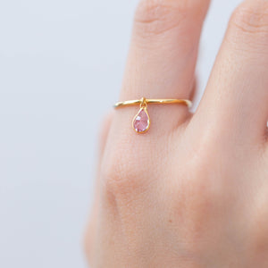 Swinging pear pink sapphire ring