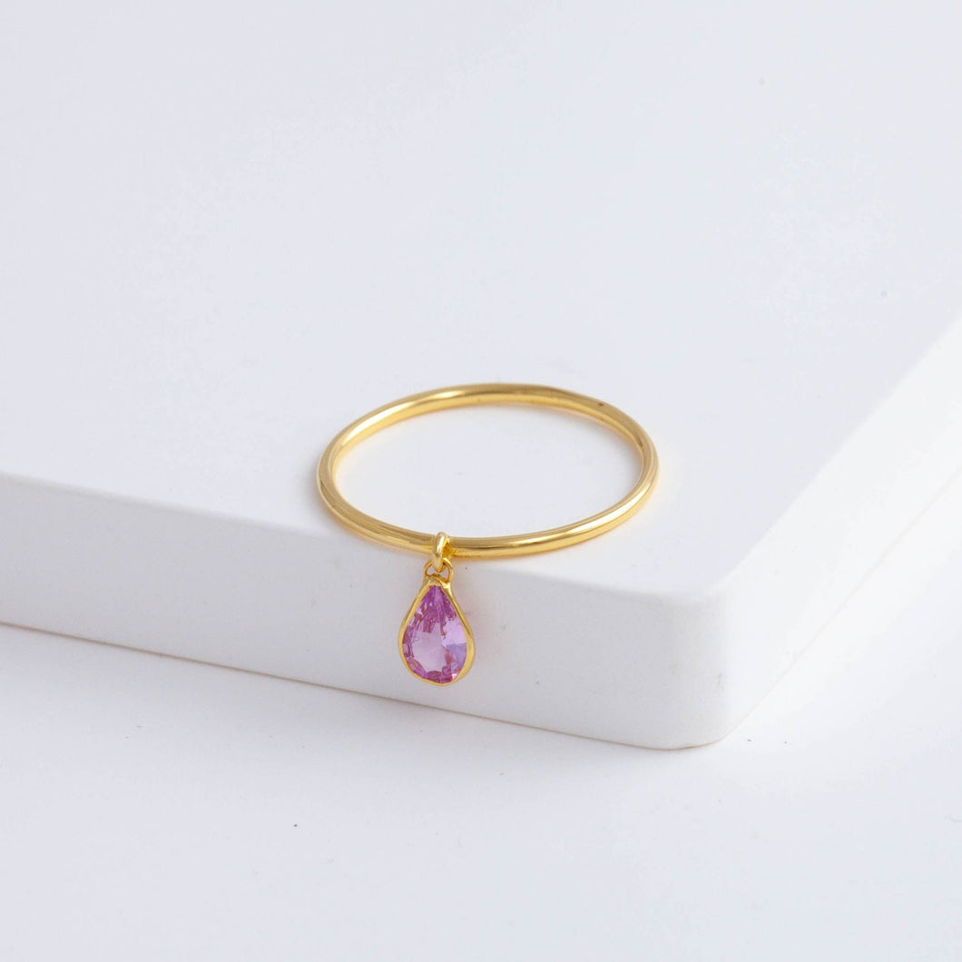 Swinging pear pink sapphire ring