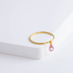 Swinging pear pink sapphire ring