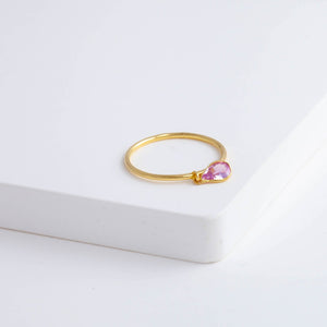 Swinging pear pink sapphire ring