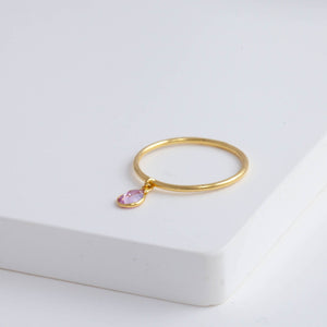 Swinging pear pink sapphire ring