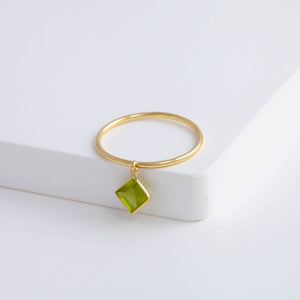 Swinging square peridot ring