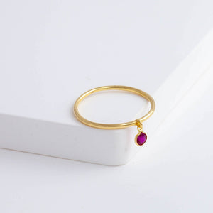 Swinging round ruby ring