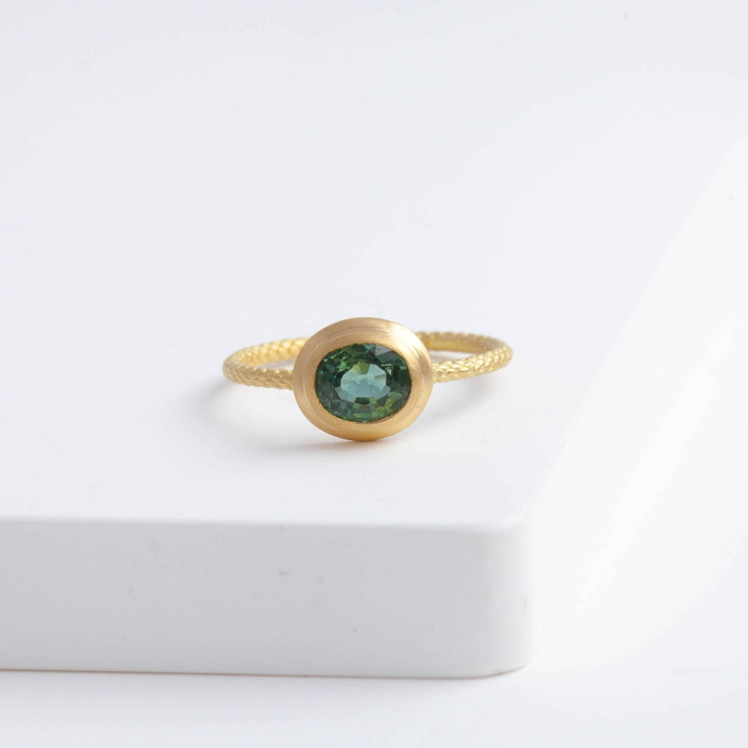 One of a kind teal sapphire ring