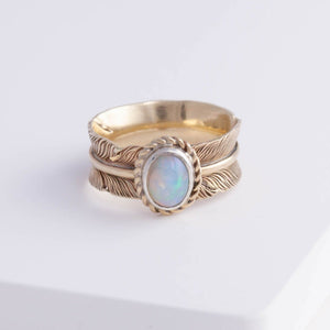 Gold large infinity feather ring with Ethiopian opal