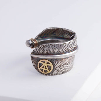 Oxidized silver large feather ring with logo