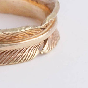 Gold infinity feather ring
