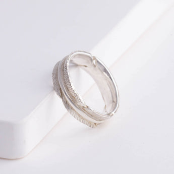 Silver infinity feather ring
