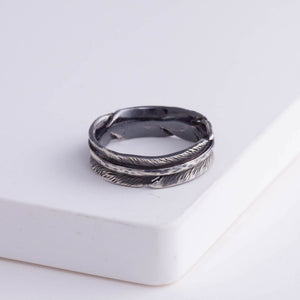 Oxidized silver infinity feather ring